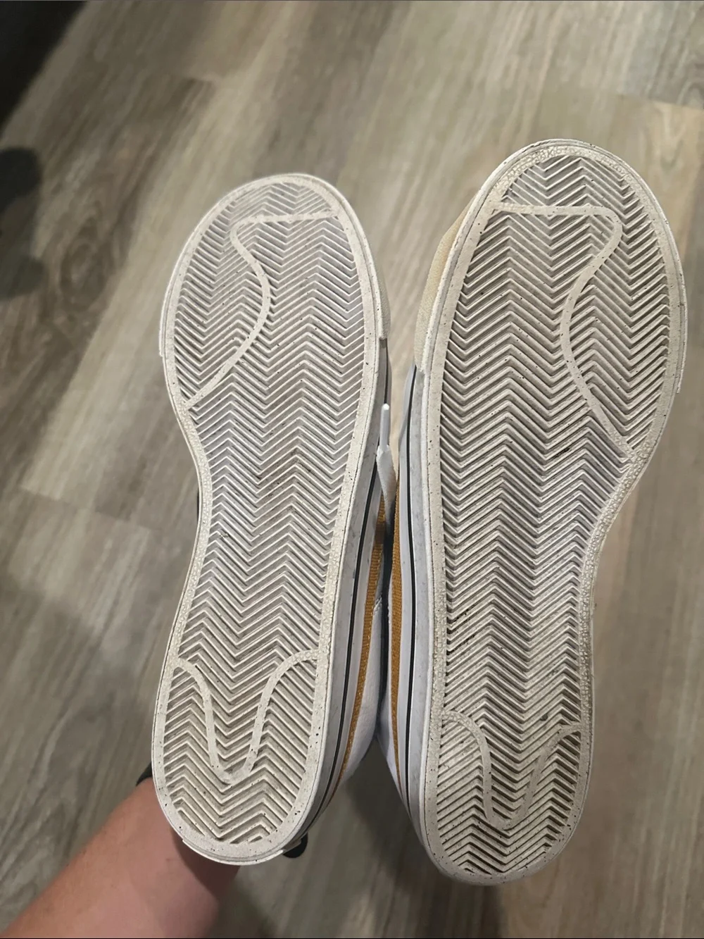 Nike White Low-Top Sneakers with Black Swoosh and Tan Trim court legacy